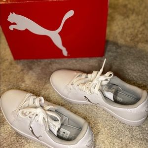 Women Puma leather athletic shoes.